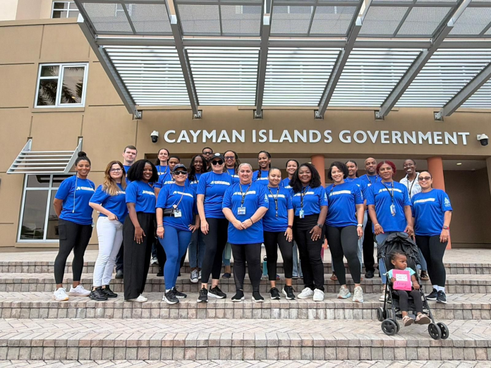 Minister Katherine Ebanks-Wilks (front row centre) and the Ministry of Health, Environment and Sustainability team as they prepare to go on their weekly walk (Photo: Cayman Islands Government)