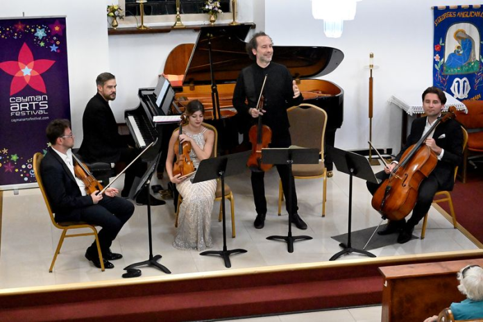 SoNoRo founder and violist Razvan Popovici (standing) will be among those performing (Photo: Supplied by CayMusicA)