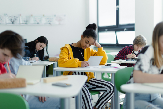 The Cayman Islands will introduce CXC's new assessment model from the 2027 academic year as AI changes how student work is assessed (Photo: Unsplash / Getty Images)